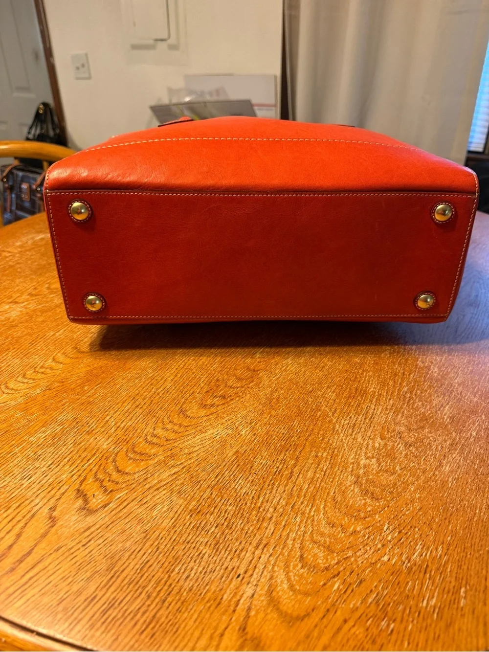 Coach Orange Leather Shoulder Bag with Pink Scarf Accent